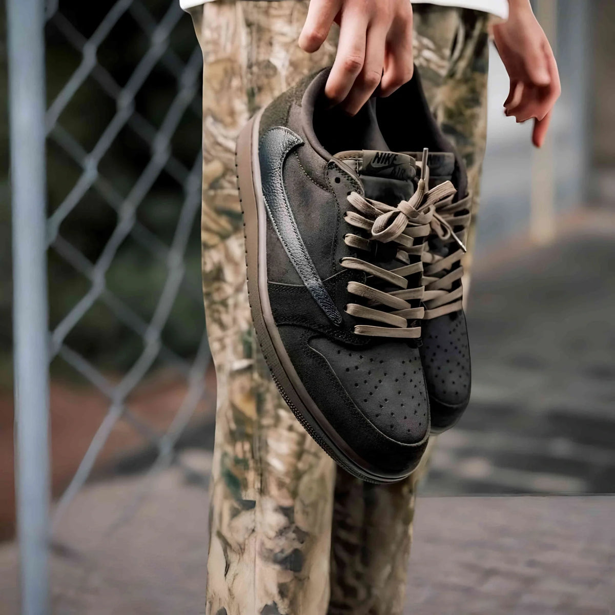 Travis Scott x Air Jordan 1 Retro Low OG SP in Velvet Brown.