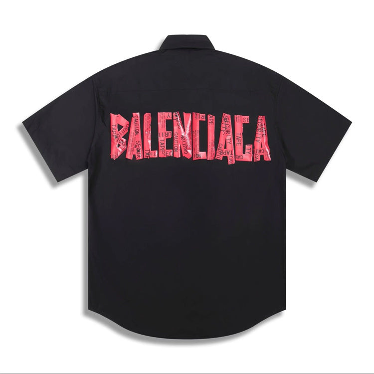 Balenciaga Short-Sleeve Shirt: A short-sleeve collared shirt with a large contrasting Balenciaga graphic on the back
