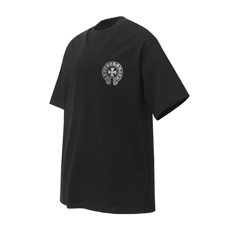 Chrome Hearts Chest Logo T-Shirt: A black short-sleeve T-shirt with a small circular chest graphic