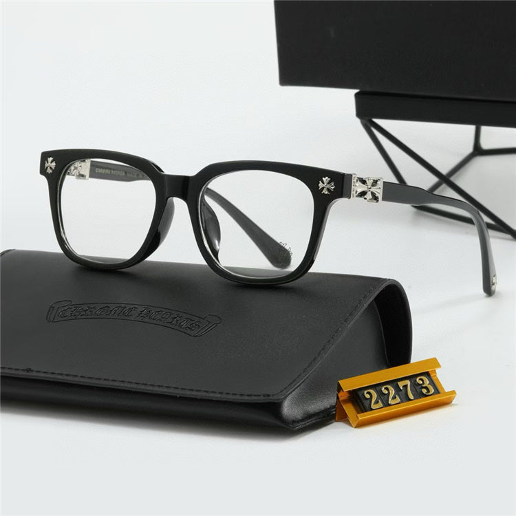 Chrome Hearts Eyeglasses – Wide Frame: Wide eyeglass frames with a dark front and cross-style details at the temples