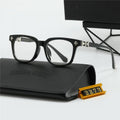 Chrome Hearts Eyeglasses – Wide Frame: Wide eyeglass frames with a dark front and cross-style details at the temples