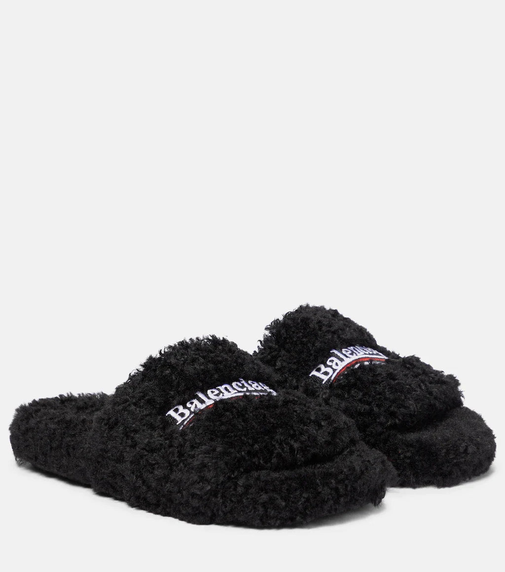 Balenciaga Slides: Open-toe slides with a textured upper and contrasting logo details