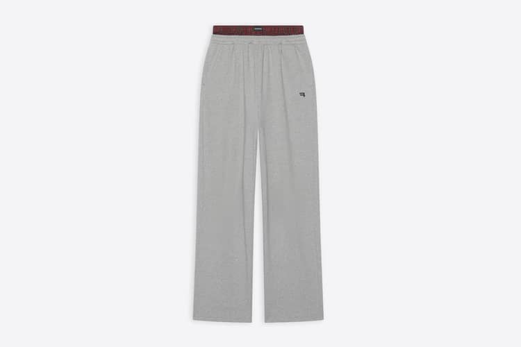 Balenciaga Grey Sweatpants: Grey sweatpants with wide legs and a contrasting waistband detail