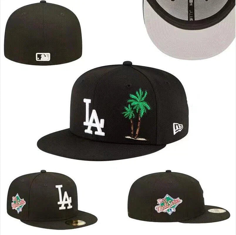 New Era LA Palm Tree Fitted Cap: A dark fitted cap with white LA embroidery and a green palm-tree graphic