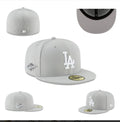 New Era LA Fitted Cap – Grey: A grey fitted cap with tonal LA embroidery and a flat peak