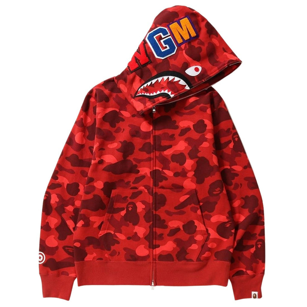 BAPE Shark Camo Hoodie: A camouflage zip-up hoodie with a shark graphic on the hood and contrasting lettering