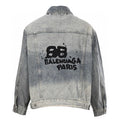 Balenciaga Denim Jacket: A denim jacket with a large back logo graphic and a washed appearance